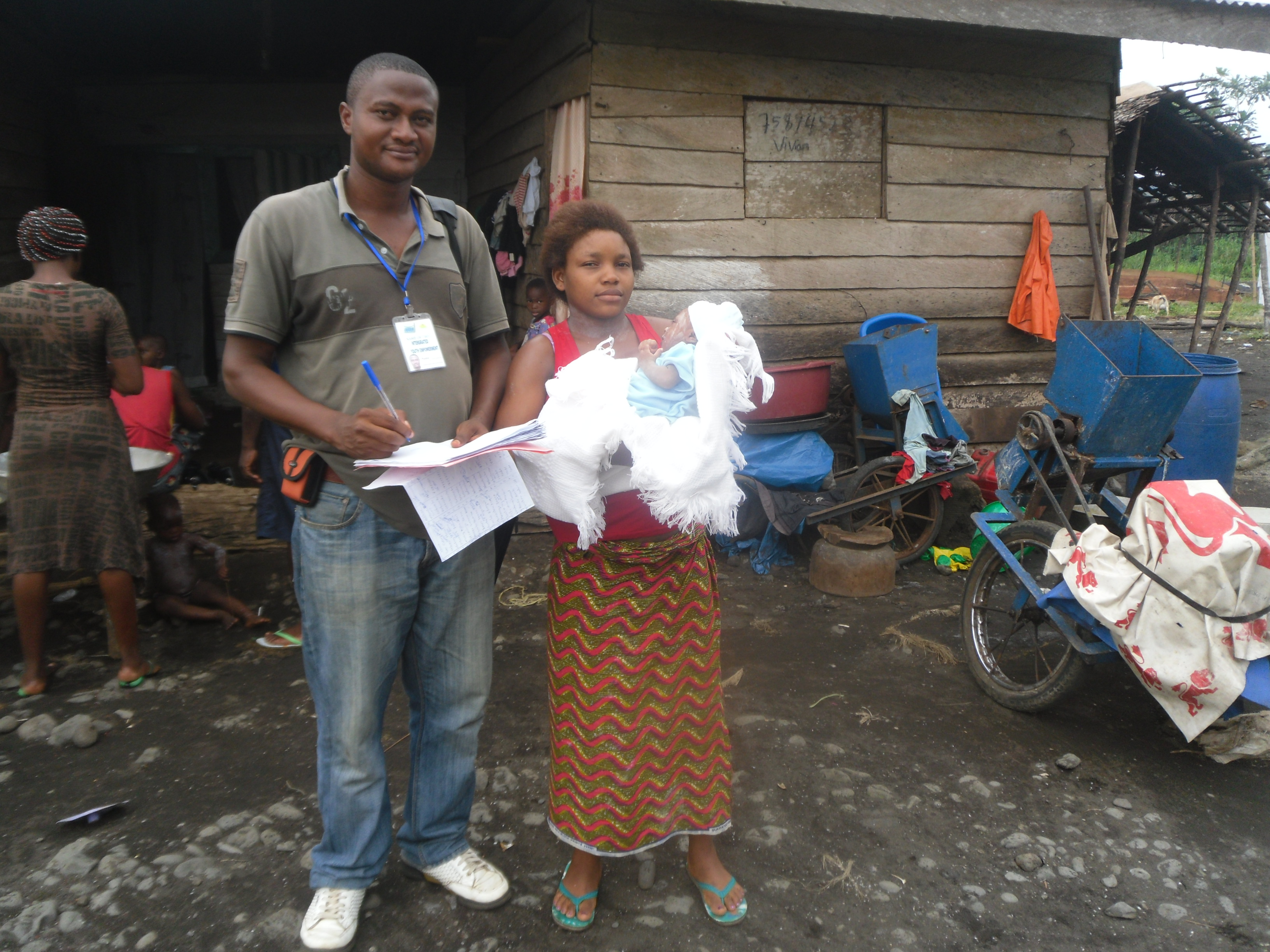 The project coordinator verifying the case of teenage delivery mother who had her baby at the stripe health centre.